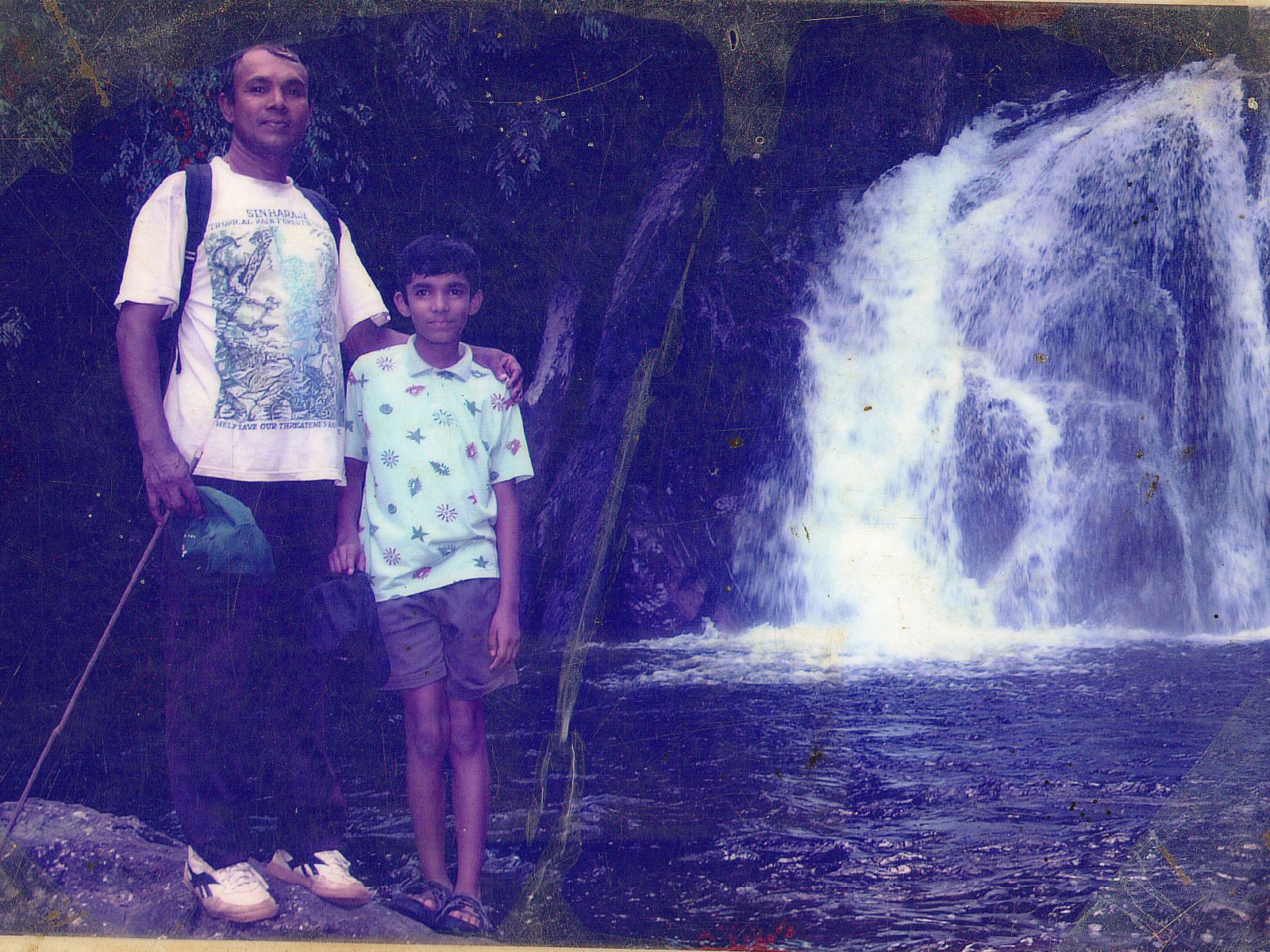 Achi with his father in Sinharaja Rainforest